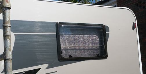 Dull, oxidized motorhome before restoration
