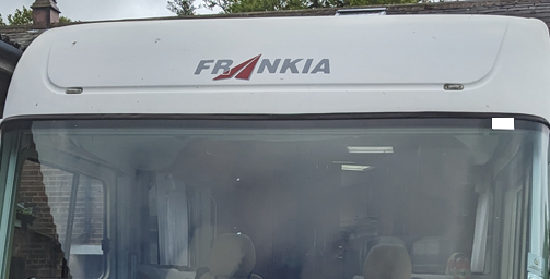 Dull, oxidized motorhome before restoration